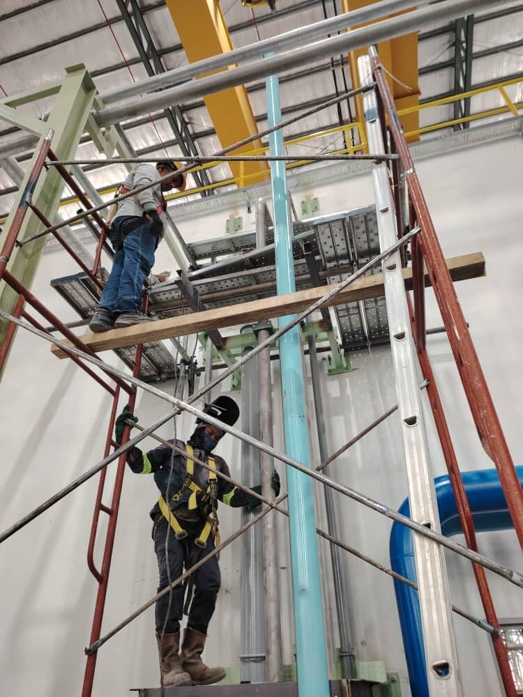 Pipework and support steel installed at height under fall protection