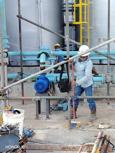Pump and valve pipework taking shape at the base of a tank farm