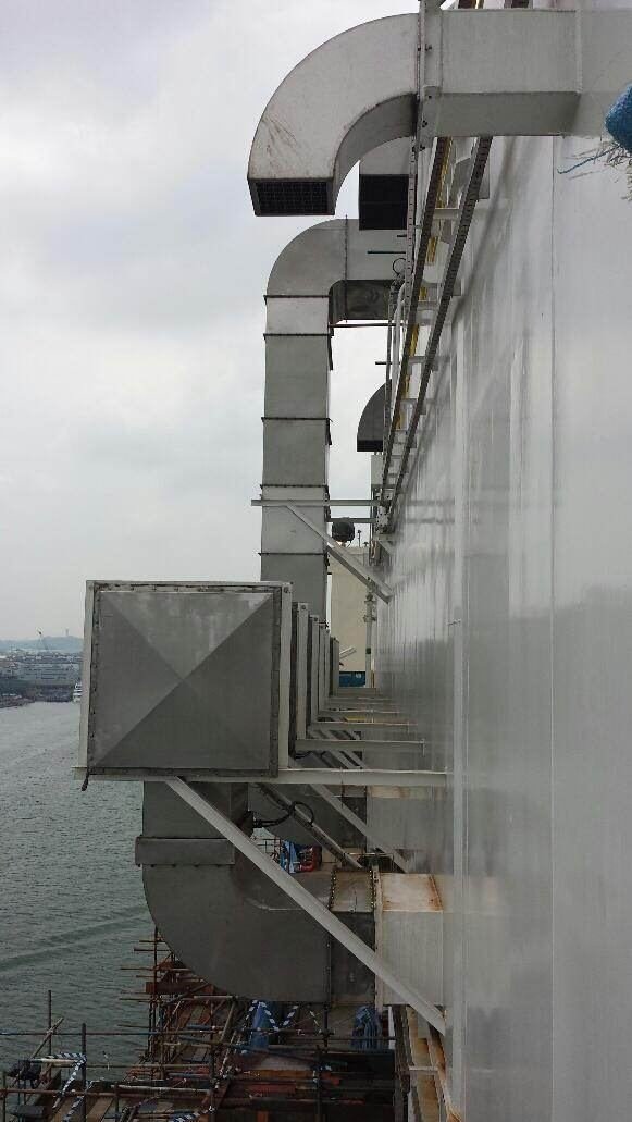 External duct discharge stack at a waterfront facility